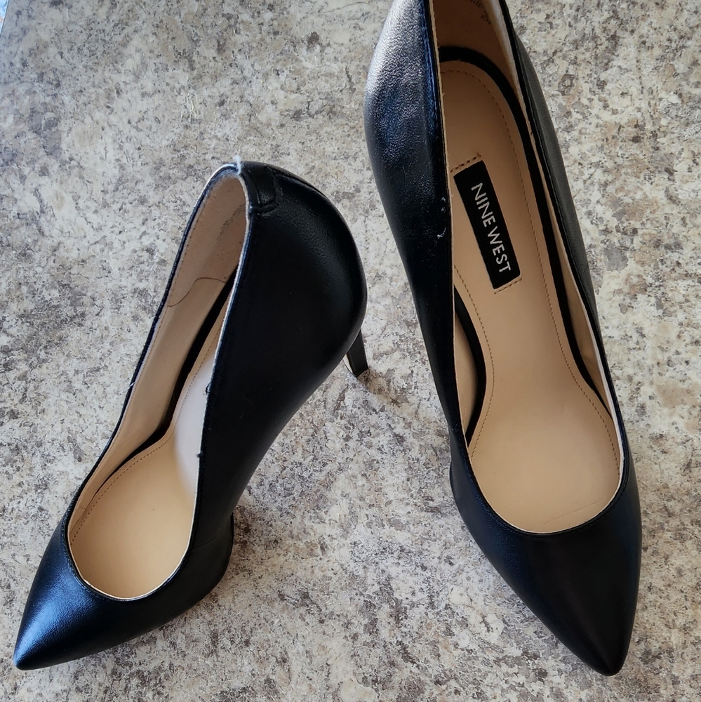 Never worn NINE West pumps.